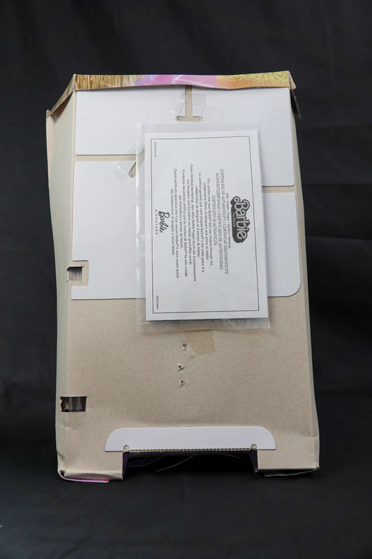 Barbie The Movie - Margot Robbie Puppe im goldenen Disco-Jumpsuit - Modell HPJ99