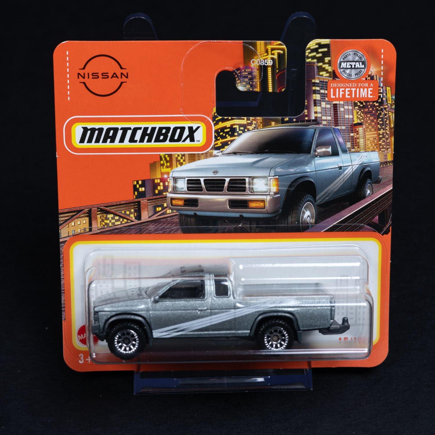 95-nissan-harbody-d21-standmodell-mattel-matchbox-164-ovp-1 - Utopia Collectibles