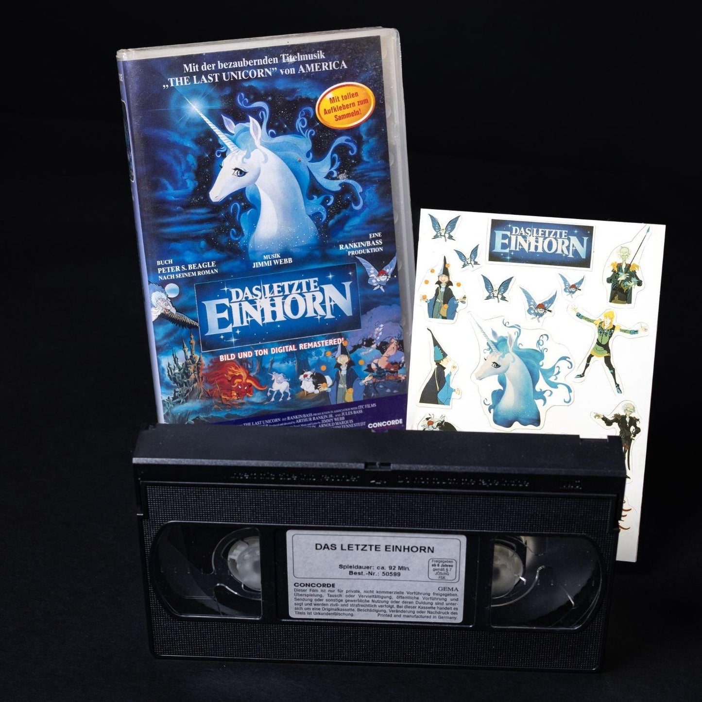 das-letzte-einhorn-vhs-remastered-cib-vollstaendig-mit-sammel-stickern-de-1 - Utopia Collectibles