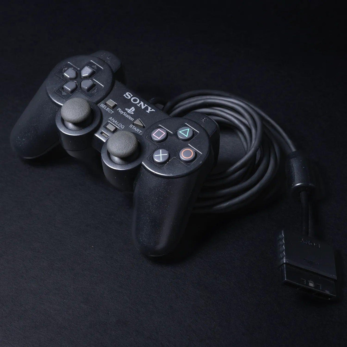 original-playstation-2-dual-shock-controller-fuer-ps2-schwarz-zustand-gut-1 - Utopia Collectibles