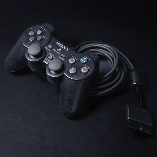 original-playstation-2-dual-shock-controller-fuer-ps2-schwarz-zustand-gut-1 - Utopia Collectibles