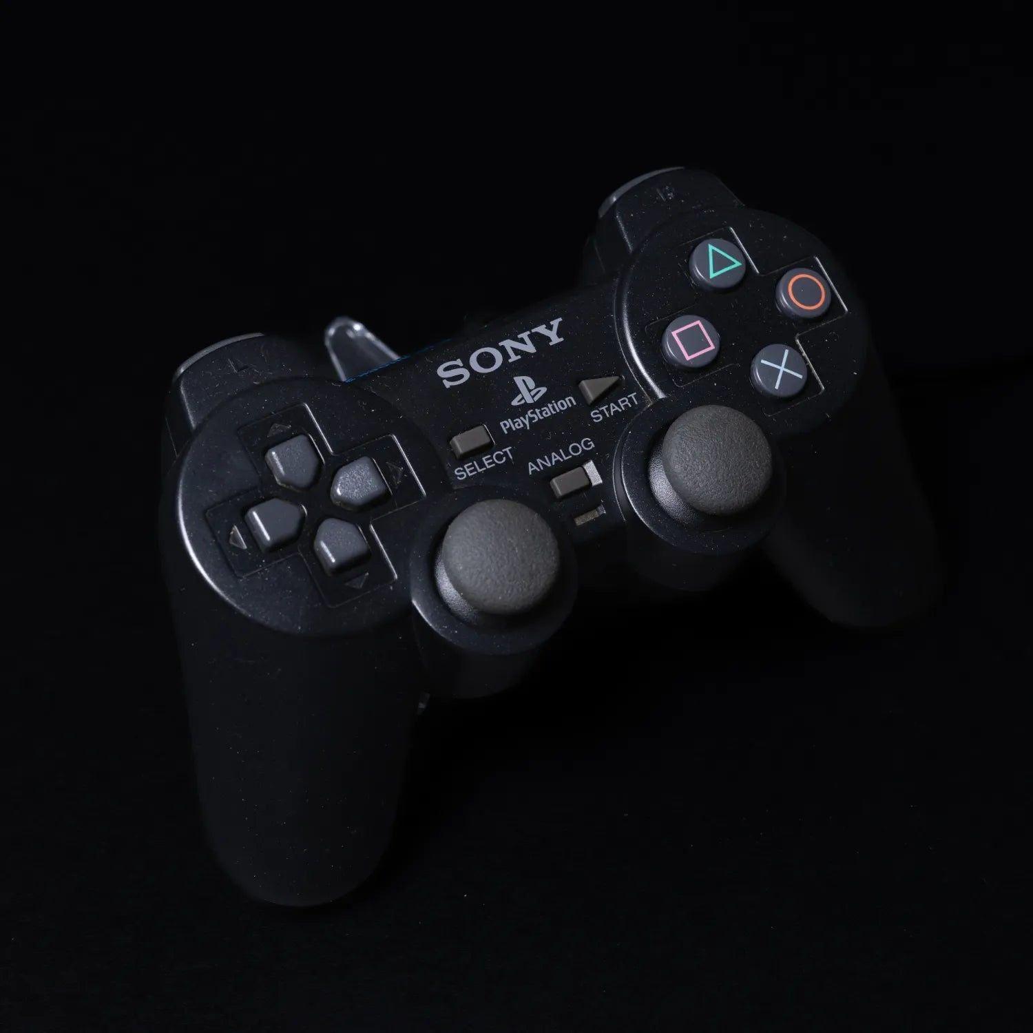 original-playstation-2-dual-shock-controller-fuer-ps2-schwarz-zustand-gut-3 - Utopia Collectibles