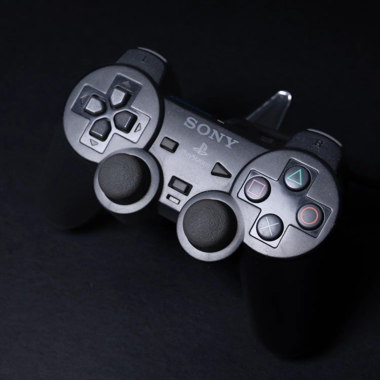 original-playstation-2-dual-shock-controller-fuer-ps2-schwarz-zustand-gut-5 - Utopia Collectibles