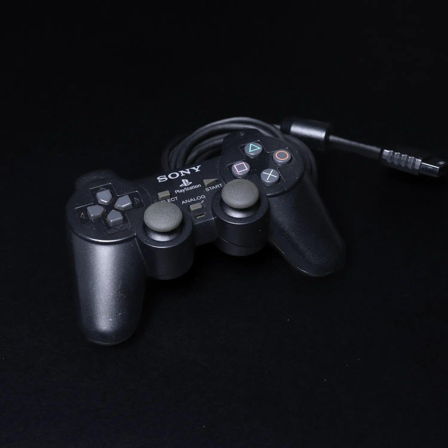 original-playstation-2-dual-shock-controller-fuer-ps2-schwarz-zustand-gut-6 - Utopia Collectibles