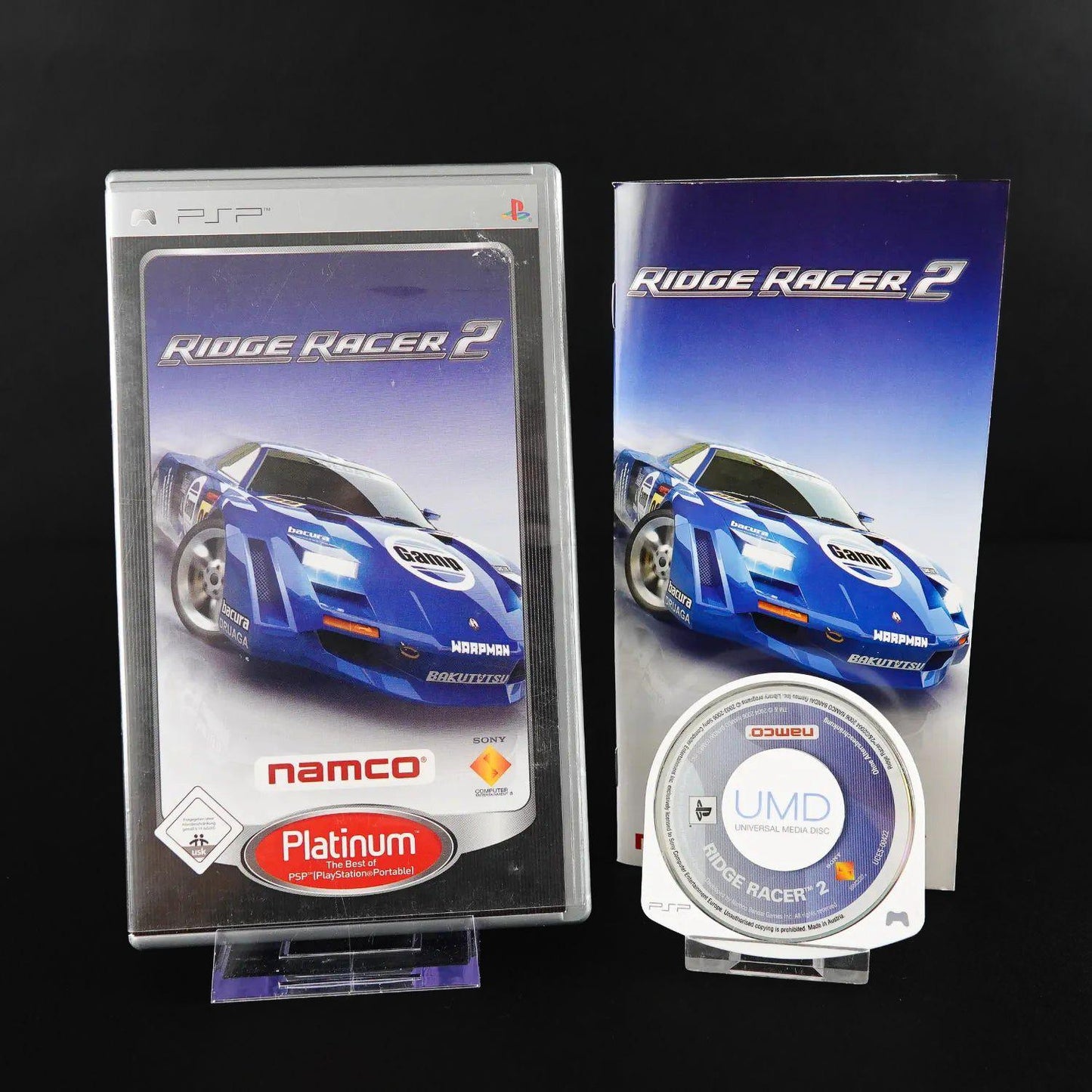 ridge-racter-2-playstation-portable-psp-platinum-cib-komplett-gebraucht-1 - Utopia Collectibles