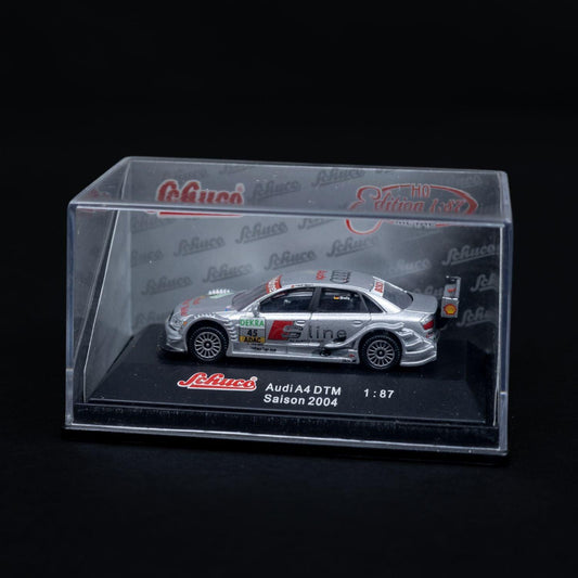 schuco-audi-a4-dtm-saison-2004-modellauto-187-mit-mini-showcase-neuwertig-1 - Utopia Collectibles