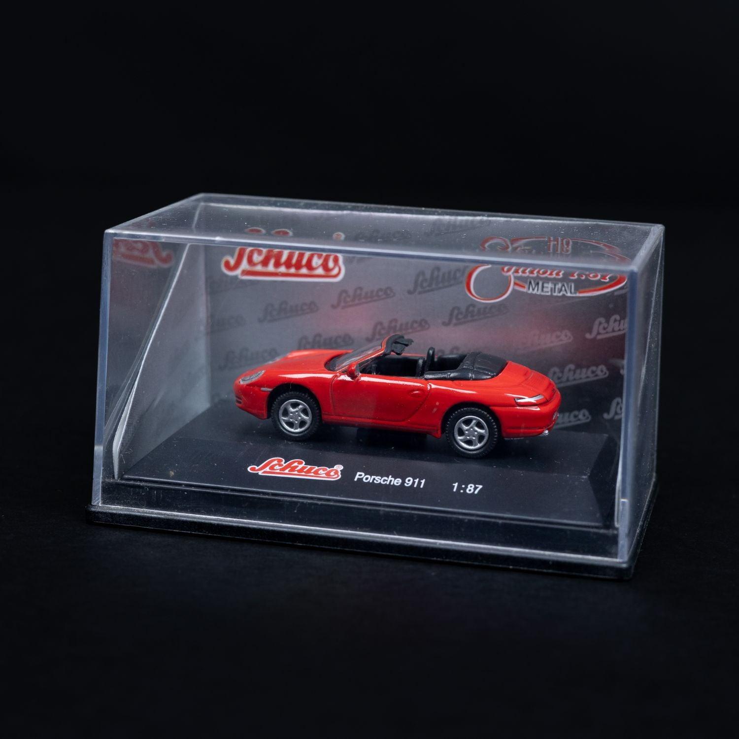 schuco-porsche-911-rot-modellauto-massstab-187-mit-mini-showcase-neuwertig-1 - Utopia Collectibles
