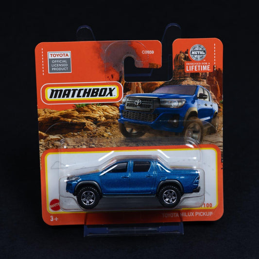 toyota-hilux-pickup-fuer-sammler-standmodell-mattel-matchbox-164-ovp-1 - Utopia Collectibles