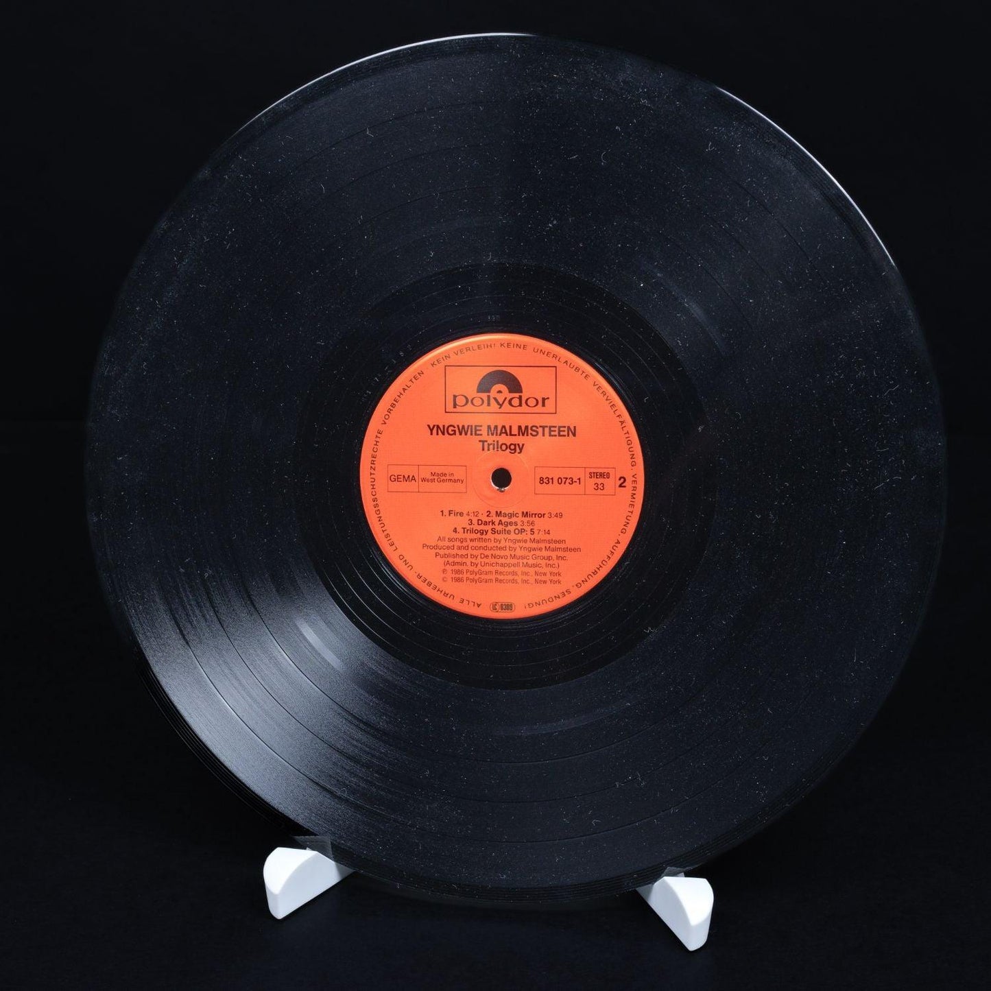 yngwie-j-malmsteen-trilogy-vinyl-lp-12-schallplatte-nm-vg-5_ab4f0d06-2173-4776-9baa-49877efa914b - Utopia Collectibles