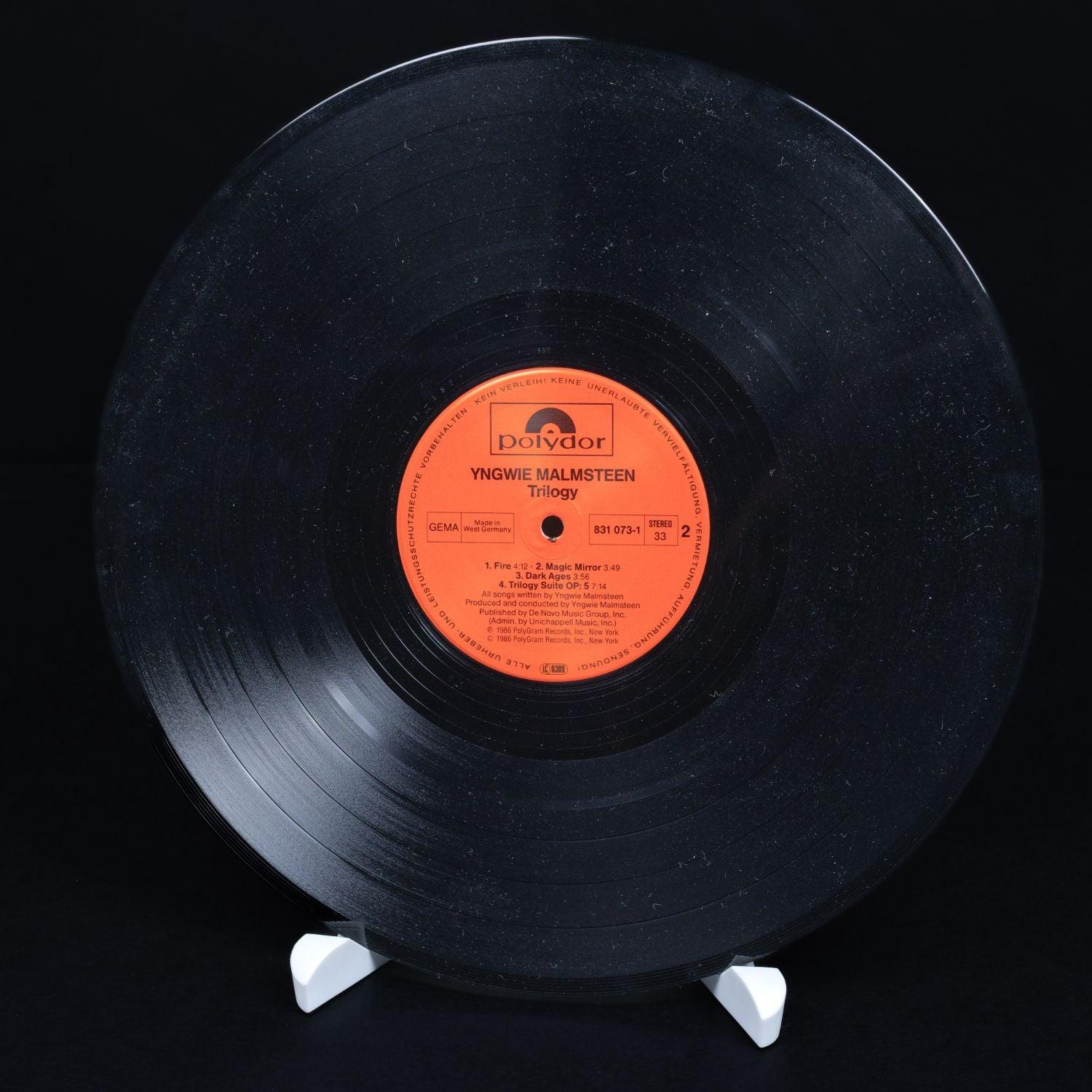 yngwie-j-malmsteen-trilogy-vinyl-lp-12-schallplatte-nm-vg-5_ab4f0d06-2173-4776-9baa-49877efa914b - Utopia Collectibles