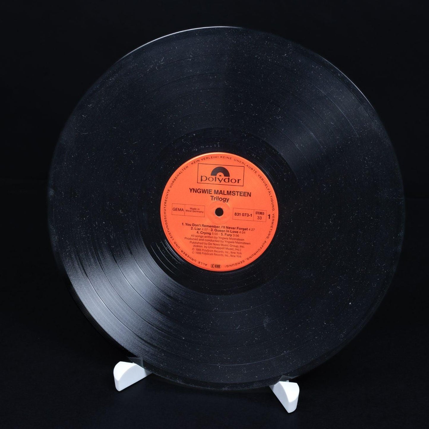 yngwie-j-malmsteen-trilogy-vinyl-lp-12-schallplatte-nm-vg-6_c50e011c-42c3-45a6-8252-192c33231797 - Utopia Collectibles